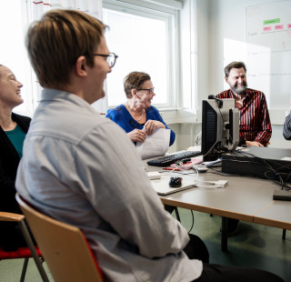 Happy people in a meeting.